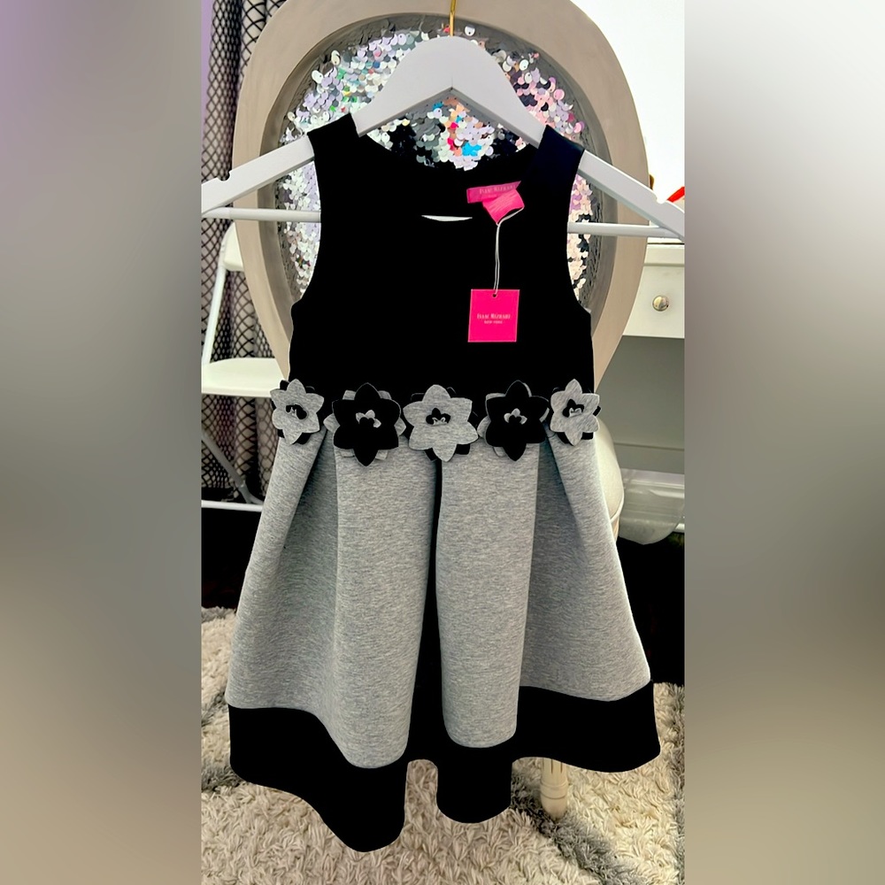 New girls, black and gray 6X dress designer is Isaac Mizrahi